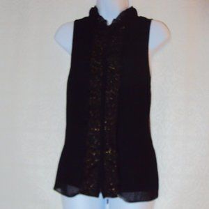 J. Lo Gold embellished black blouse.